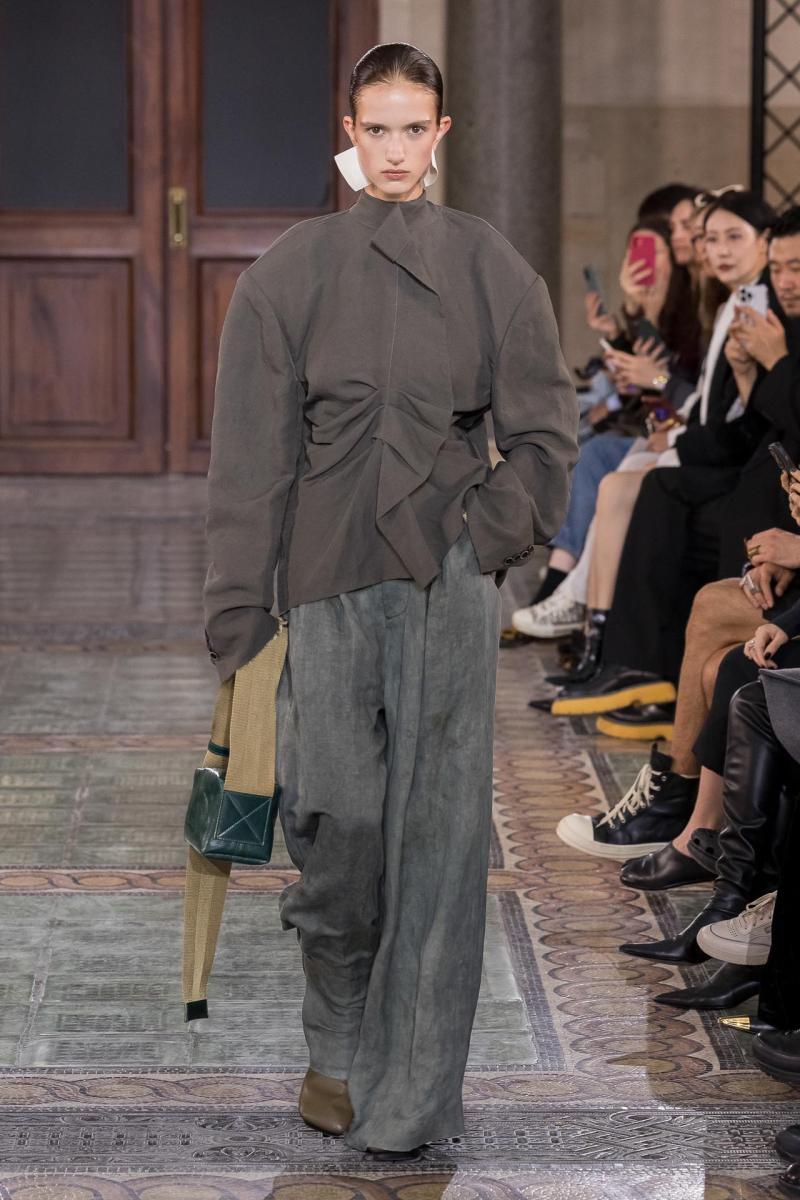 Model on the catwalk at the Uma Wang fashion show in Paris, Spring Summer 2024 Ready To Wear Fashion Week,