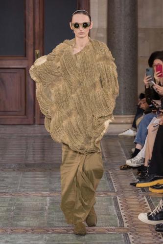 Model on the catwalk at the Uma Wang fashion show in Paris, Spring Summer 2024 Ready To Wear Fashion Week,